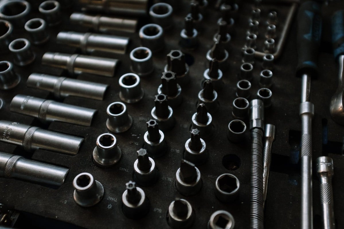 A set of metal tools on a table in the workshop of a car mechanic in Santa Rosa.